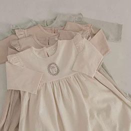 فستان كريمي من قماش القطن الطبيعي-متوسط الطول